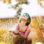 Cute little girl having fun outside