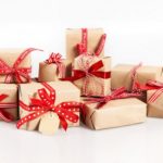 Large stack of decorative Christmas gifts