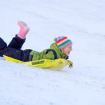 Happy Girl Sledding