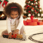 Cute girl enjoy playing with new toy