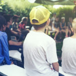 Meeting of children in the camp in a summer sunny day