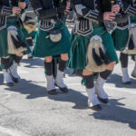 Closeup of green kilts of bagpipes players at 2017 St. Patrick’s