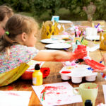 Group of young kids enjoying artworks