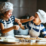 happy family funny kids bake cookies in kitchen