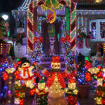 Christmas outdoor Christmas decorations – Snowman and nutcracker lights up house in Brooklyn, New York