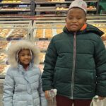 Kam’Dynn(4) Kee’Gean(8) at Krispy Kreme