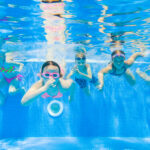Children swim in  pool