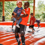 boy and girl bounce pad